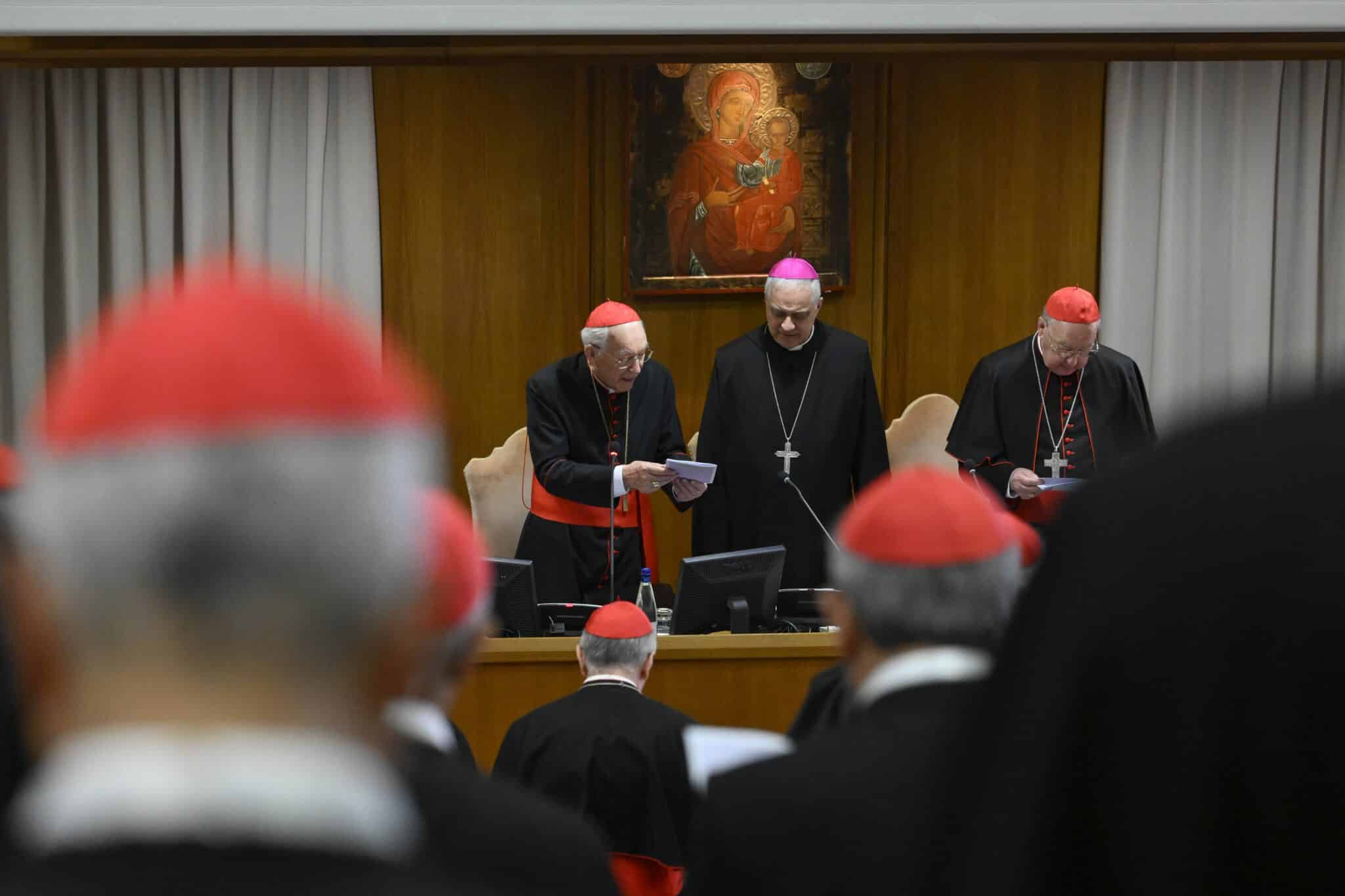 Benedictine Abbot Donato Ogliari, abbot of St. Paul Outside the Walls in Rome, center, offered a spiritual meditation April 29, 2025, in the Vatican synod hall to cardinals attending the general congregation before the conclave begins. The abbot is seated between Cardinal Giovanni Battista Re, dean of the College of Cardinals, and Cardinal Kevin J. Farrell, chamberlain of the Holy Roman Church. (CNS photo/Vatican Media)