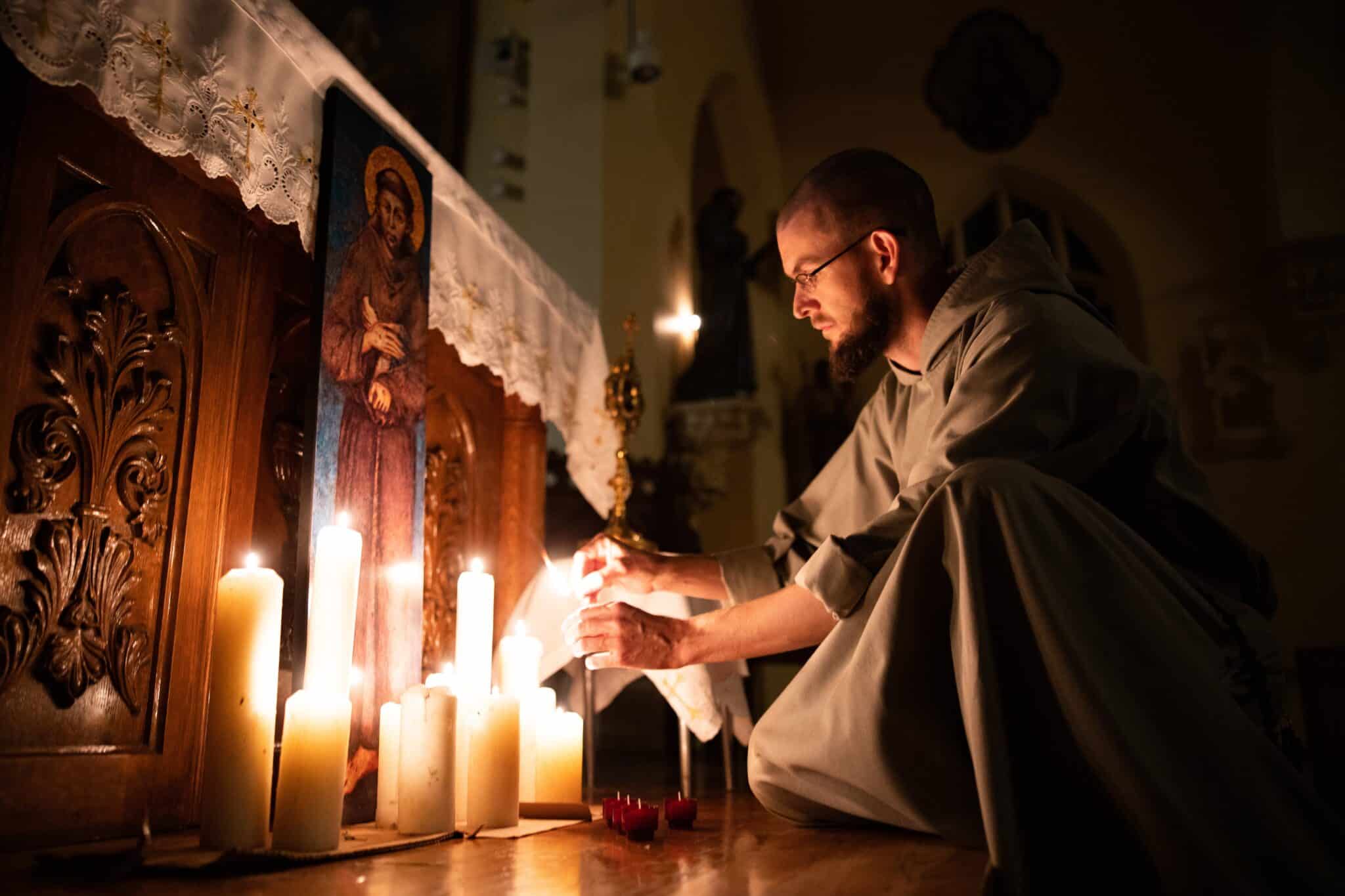 Father Gabriel Emmanuel prepares the sanctuary for the "transitus"