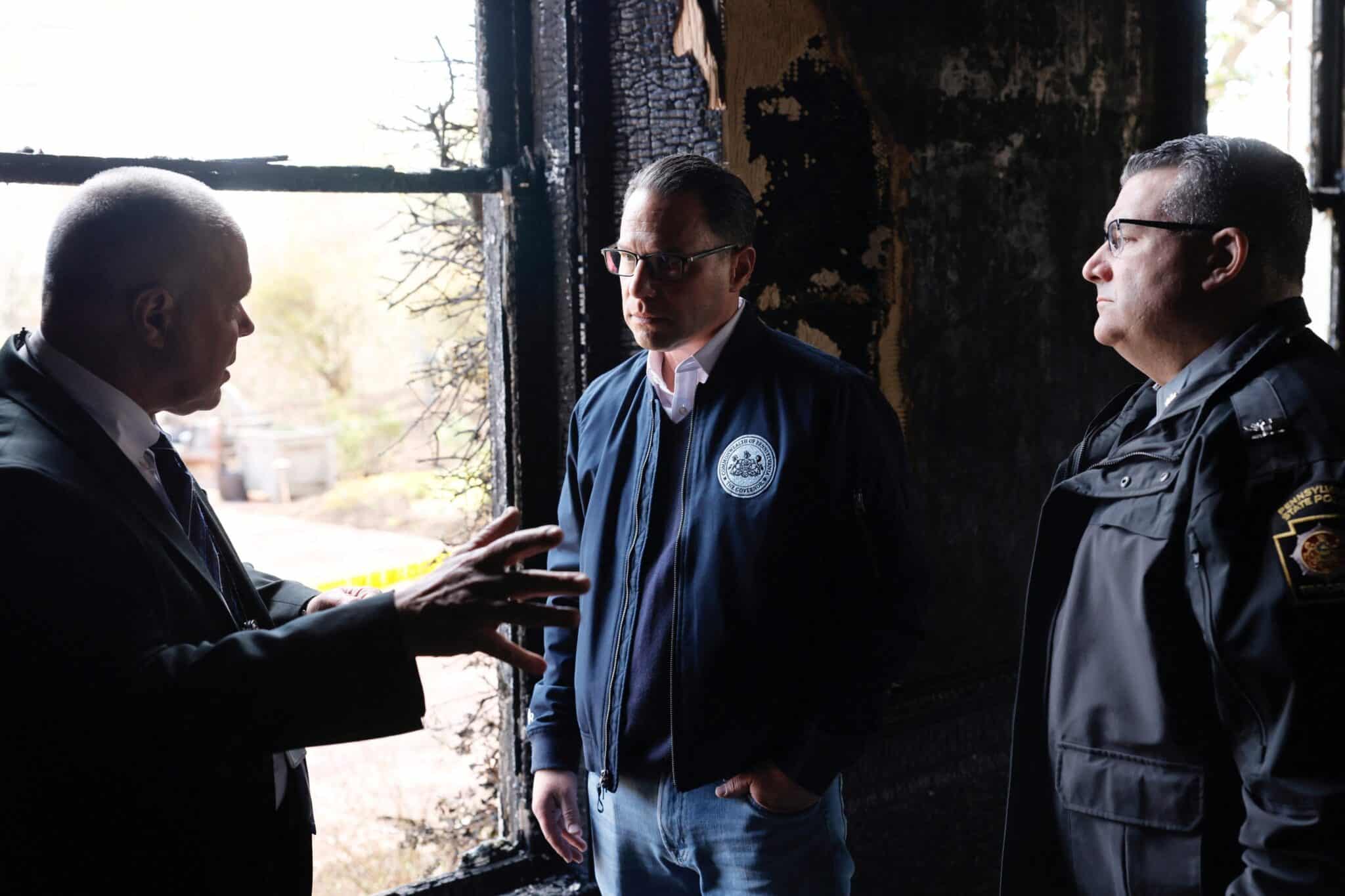 Pennsylvania Gov. Josh Shapiro speaks with investigators ahead of providing an update on the act of arson that took place at the governor's residence in Harrisburg April 13, 2025.
