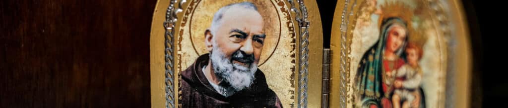 Framed pictures of Saint Padre Pio and the Blessed Virgin Mary