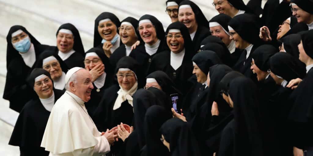 Pope Francis talks with enthusiastic sisters
