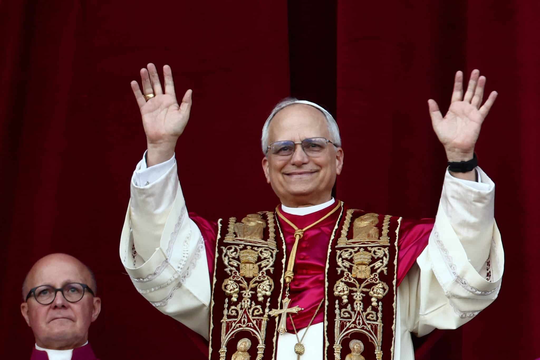Cardinal Robert Francis Prevost, who has chosen the papal name Leo XIV, appears on the central balcony of St. Peter's Basilica at the Vatican May 8, 2025, following his election during the conclave. He is the first American pope in history.