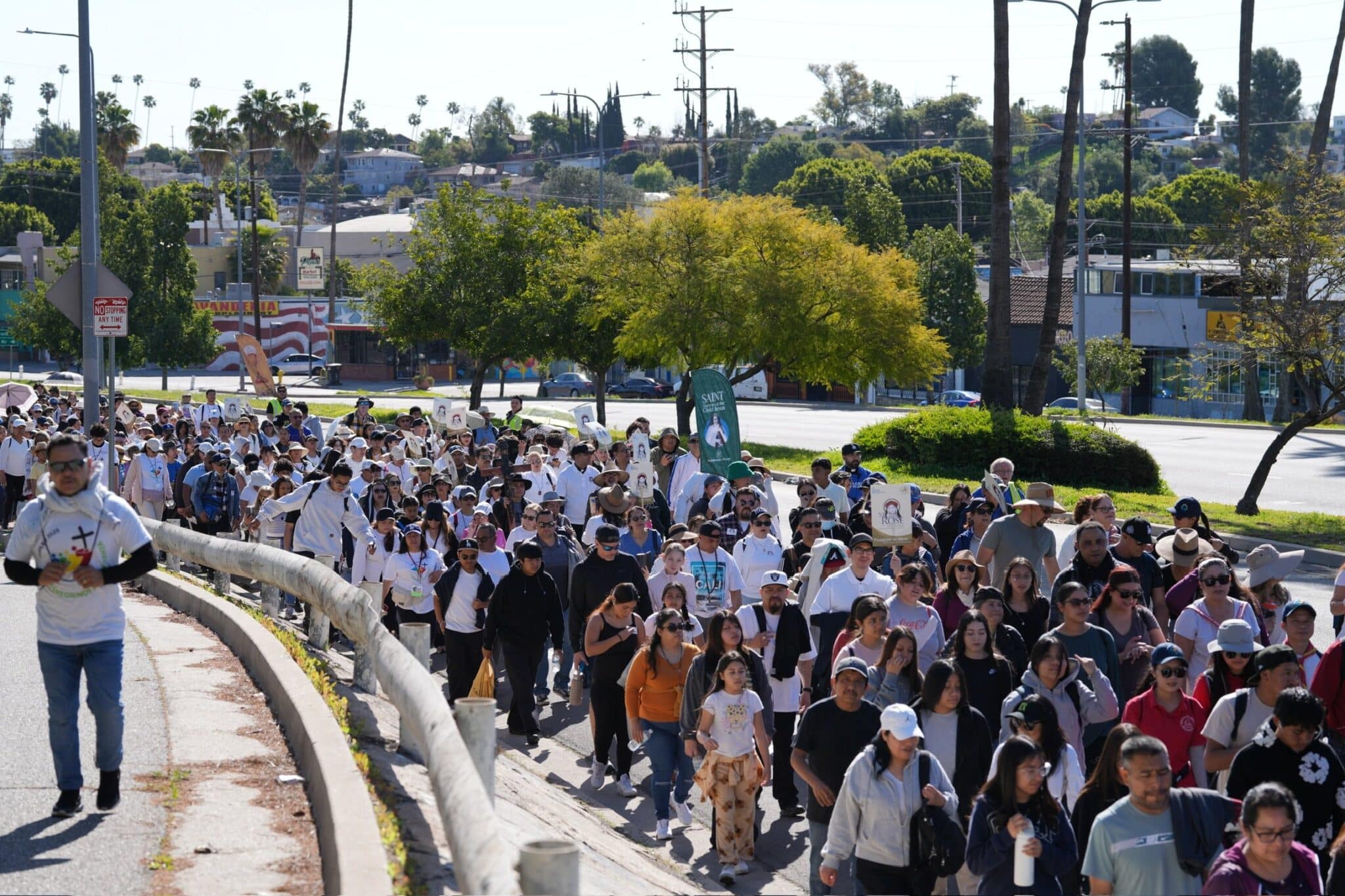 Thousands of pilgrims process from All Souls Church in Alhambra, Calif., to the Cathedral of Our Lady of the Angels in Los Angeles April 5, 2025.