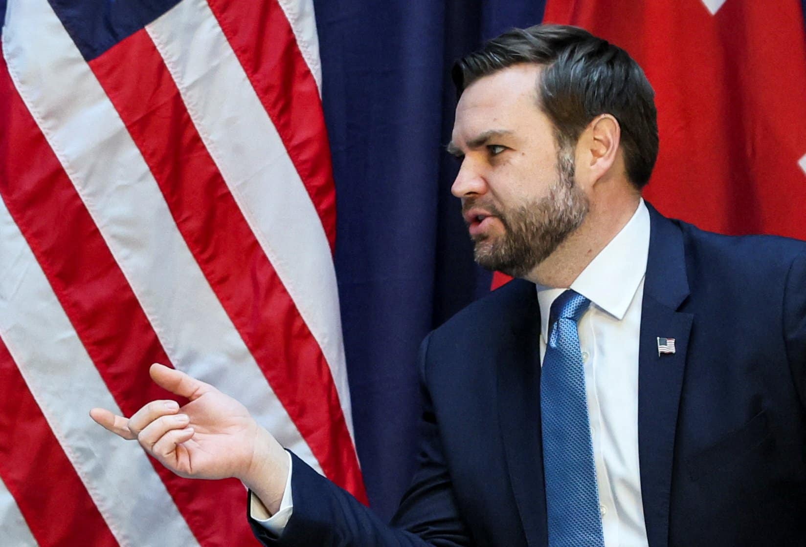 U.S. Vice President JD Vance speaks as he participates in a bilateral meeting with British Foreign Minister David Lammy at the Commerzbank in Munich, Germany, February 14, 2025.