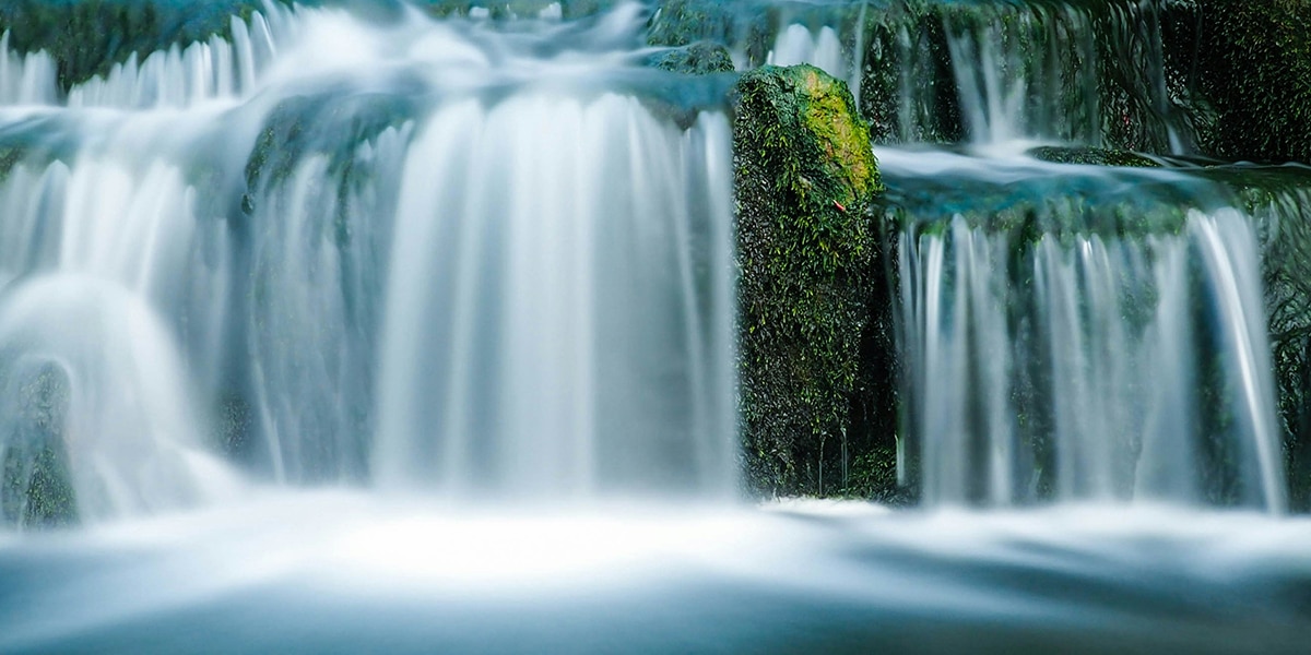 fresh water falling from a waterfall