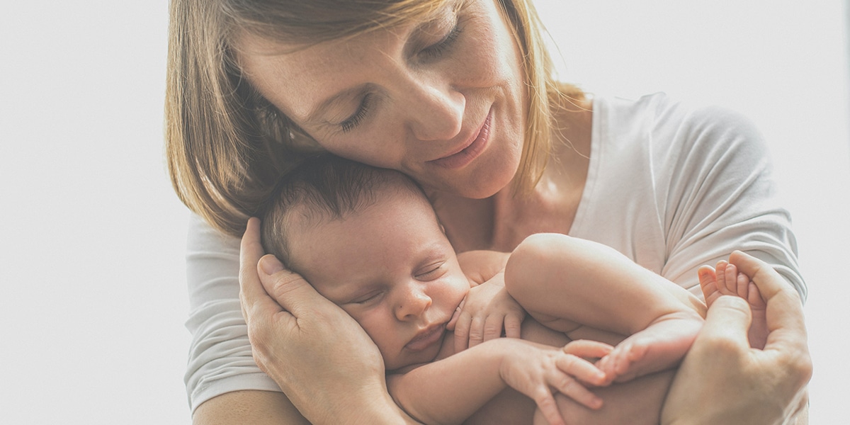 woman holding an infant